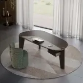 Elegant coffee table with dark espresso wood frame and matte satin finish and muted gray‑green frosted glass inset