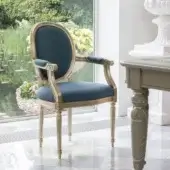 Elite Bellotti Ezio 1197 dining armchair deep blue‑teal upholstered, wooden frame finished with luminous silver‑gold leaf enamel