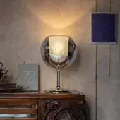 Distinguished Penta Glo table lamp with mirrored glass and sandblasted inner shade in metallic silver with frosted white tones