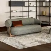Luxury Ruby Sofa by Cattelan Italia, upholstered in muted gray‑green textured textile with exposed medium‑brown wood matte