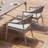 Stylish Varaschin Clever armchair with a powder-coated aluminum frame and hand-woven synthetic cord backrest in light grey cushioning