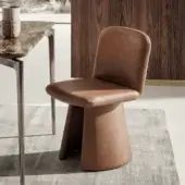 Elite Alivar Ila chair with smooth tan leather upholstery, matte finish, and sculpted, organic silhouette