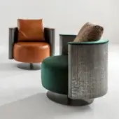 Exclusive Laurameroni Amelie lounge chair with brown leather seat and back, Liquid Metal shell, matte titanium swivel base