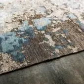 Distinctive Cattelan Italia Radja rug crafted in cotton and chenille with captivating abstract blue and brown shades and relief texture