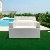 Architectural Trona Softrona outdoor sofa in uniform white finish with blocky low profile silhouette and subtle ribbing