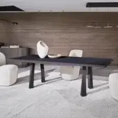 Architectural Gervasoni Jorn table crafted from dark charcoal lacquered ash wood with wide rectangular top and angled legs