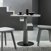 Refined Gervasoni Gray 39 Bistrot table with circular top, tapered central pedestal and solid black base in matte finish