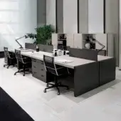 Distinguished 4 Mariani Blade desk with dark grey base supporting lighter wood, saddle leather detailing and three drawers