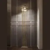 Sophisticated Paolo Castelli Anodine floor lamp in golden-yellow brass with satin matt gold finish and asymmetrical leaves