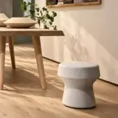 Sophisticated PIMAR Mel stool with natural stone structure in off-white tone and matte finish