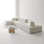 Sophisticated Modesign Penta sectional in off white bouclé textile featuring low sprawling silhouette and movable bolster style backrest cushions