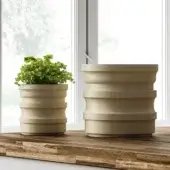 Luxury PIMAR Tornio vase set in natural stone with matte subtly textured finish and sophisticated geometric silhouette