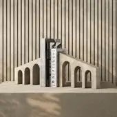 Luxury Apospersano Metafisica bookholder sculpted from natural stone with a sandy beige matte porous architectural finish