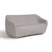 Luxury Slide Reborn sofa with sculptural curved silhouette in light grey recycled materials and refined matte finish
