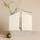 Elegant PIMAR Girasole vase crafted from pale cream stone with a sculptural geometric silhouette and matte porous finish