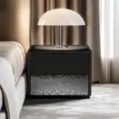 Elegant JR Home by John Richmond nightstand showcasing matte black lacquer and stainless steel lower drawer with tribal tattoo graphic