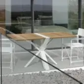 Exclusive Royal Botania Traverse folding table with rectangular teak wood tabletop and white coated aluminum base