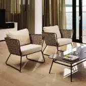 Distinguished Roberti Rattan Portofino lounge chair with dark brown Nautic Rope and light seat cushion crafted with an aluminum frame