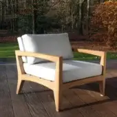 Sophisticated Royal Botania Zenhit lounge chair with teak wood structure and light gray textile cushions crafted with a natural finish