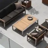 Distinguished Royal Botania Ninix coffee table with teak wood tabletop and brushed stainless steel border exhibiting natural warmth
