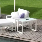 Superior Royal Botania Ninix lounge side table with white coated aluminium frame and clear glass tabletop