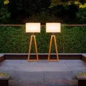 Sophisticated Royal Botania Club floor lamp with teak wood frame and electro-polished stainless steel built in a light beige textile lampshade