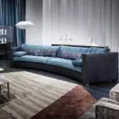 Exceptional Erba Alchimia sectional crafted in Italy with muted teal blue textile and charcoal gray accents