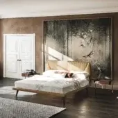 Sophisticated Cattelan Italia Amadeus bed with light tan leathertex upholstery and dark satin-finished wood frame built with angled, matt bronze legs