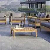 Exclusive Varaschin Bali coffee table crafted in warm medium brown plantation-certified solid teak wood with a satin finish