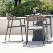 Distinguished Varaschin Clever armchair with textilene seat and synthetic cord back in muted gray powder-coated aluminum