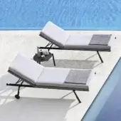 Distinguished Varaschin Bahia lounger with a dark gray powder-coated aluminum frame and light gray VAR#TEX upholstery