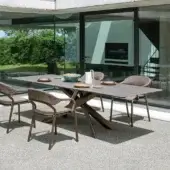 Refined Varaschin System Star table with extruded aluminum base and durable HPL tabletop in muted gray with textured matte finish