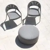 Distinguished Varaschin Belt ottoman with medium gray textile upholstery crafted for comfortable outdoor seating and lasting durability