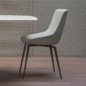 Distinctive Bonaldo Artika chair with light gray coated textile and seamless extended backrest built with dark legs