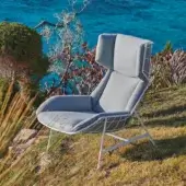 Distinctive Varaschin Summer Set Bergere lounge chair with light gray textile upholstery and smooth matte metal frame