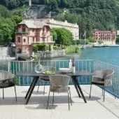 Distinguished Potocco Katana table with dark gray matte metal frame and tabletop exhibiting balanced minimalist design