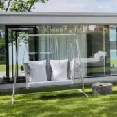 Elegant Varaschin Tibidabo outdoor swing with Silk Grey powder-coated aluminum and Perla hand-woven PVC fiber rope cushions