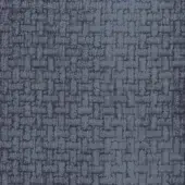 Dark gray-blue textured fabric sample with irregular, stone-like pattern; tightly woven with tonal variations and a small orange speck.
