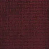 Burgundy fabric texture with a dense, nubby weave and interlocking geometric pattern; studio sample displaying Mariani “Le Fate” textile.