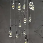 Stunning Reflex Sassi suspension lamp with mirror glass support and cascading transparent plus gold Murano glass pendants