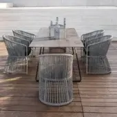 Distinctive Varaschin Tibidabo armchair with woven construction in Perla Brown Rope and grey, showcasing an intricately textured finish