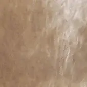 Distressed tan leather texture with mottled pattern, cream to deep tan tones, matte finish, visible grain, and “arketipo > cuoio > cuoio tribe 1030” text.