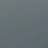 Granular gray texture with subtle tonal variations, displaying a diffused, particulate pattern and a darker concentration towards the bottom.