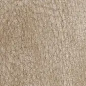 Leather texture sample, light tan with vertical and diagonal ridges, granular surface displaying natural grain and subtle tonal variations.