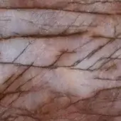 Flamingo quartz marble slab with layered pink, cream, and terracotta tones, featuring diffused gray veining and a polished finish.