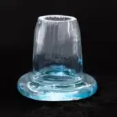 Light blue glass candlestick with circular base, cylindrical form, textured surface, and swirling patterns; Barovier&Toso Aq Acquamare collection.