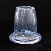 Blown glass sculpture, light blue, truncated cone shape with textured rim and visible air bubbles, artisanal production.