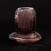 Violet crystal candle holder with vertical ribbing, tapered cylindrical shape, and undulating base, crafted by Barovier&Toso.