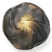 Bocci 73 sculpture, grey ceramic with bronze accents, features a pleated, organic spherical form and granular texture.