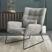 Distinguished Bonaldo Nikos lounge chair with quilted medium gray textured fabric and sleek black painted metal sled base